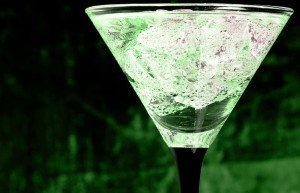 A cocktail glass with absinthe